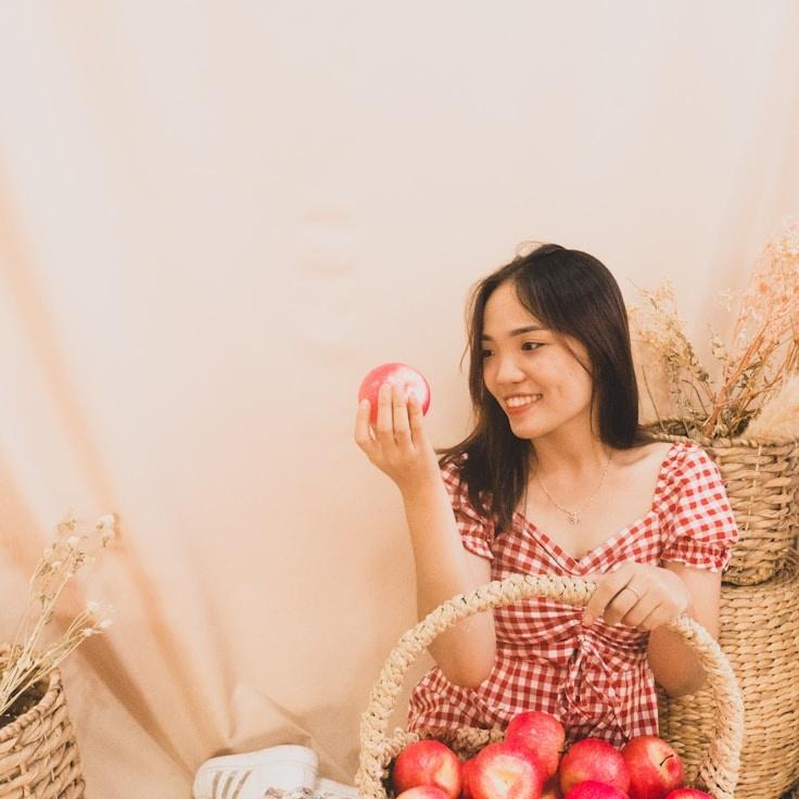 Kaveri Mehta, Lead Design Curator at GardenForestCloud, reviewing corporate floral arrangements